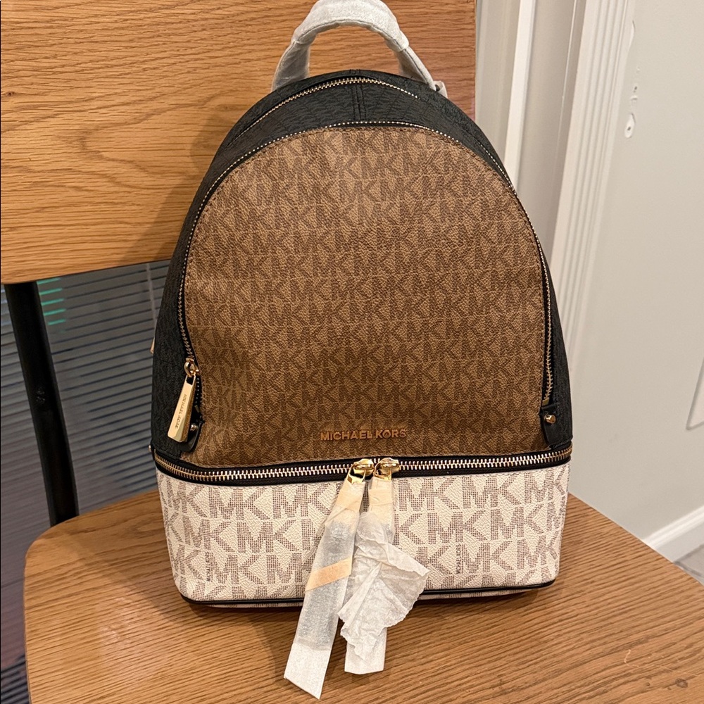 Michael Kors Black, Brown, and Cream Backpack
**Brand New**